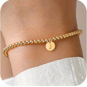 # 56 Gold Tone Beaded Bracelet with J  Initial Charm